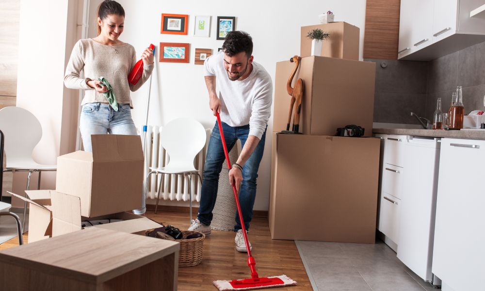 Young couple cleaning and selecting things