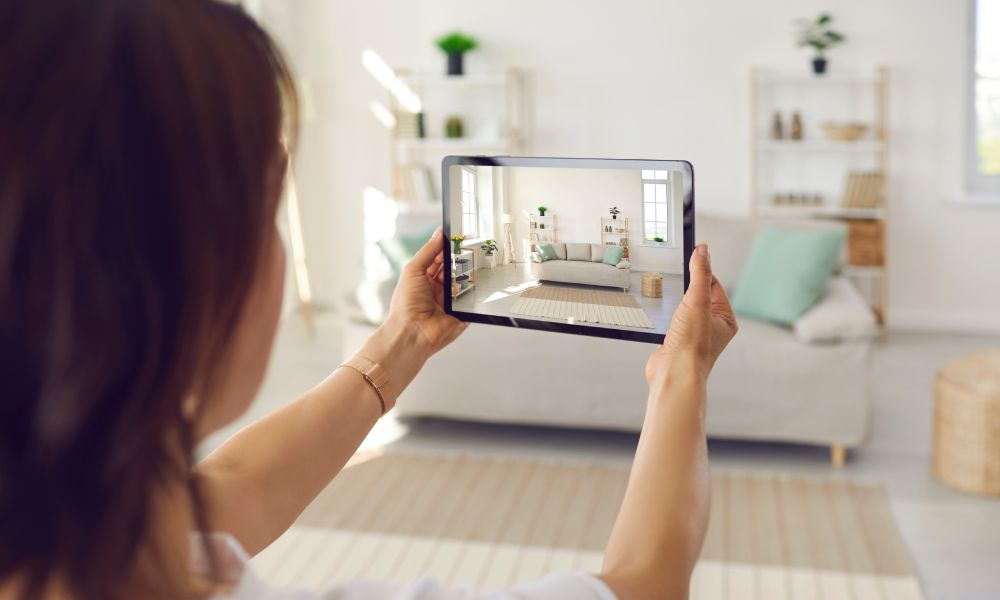 Person clicking a photo from of a room