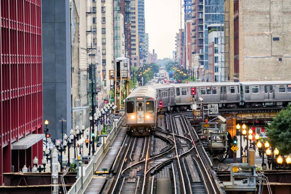 Train,On,Elevated,Tracks,Within,Buildings,At,The,Loop,,Glass