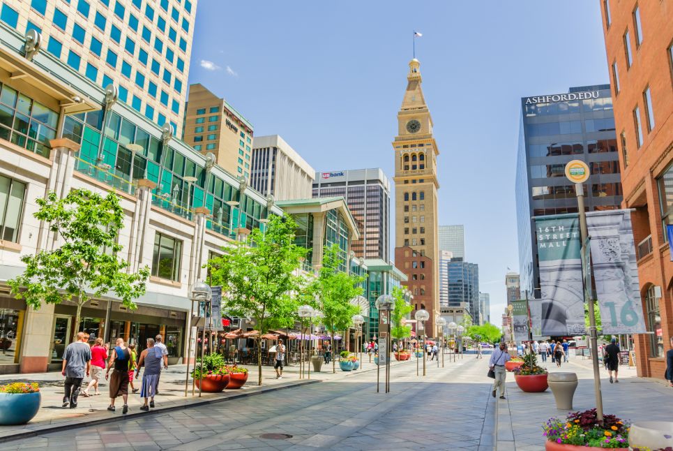 View of 16th Street Pedestrial Mall of red-and-grey Granite that Runs Through the Center of Downtown. 