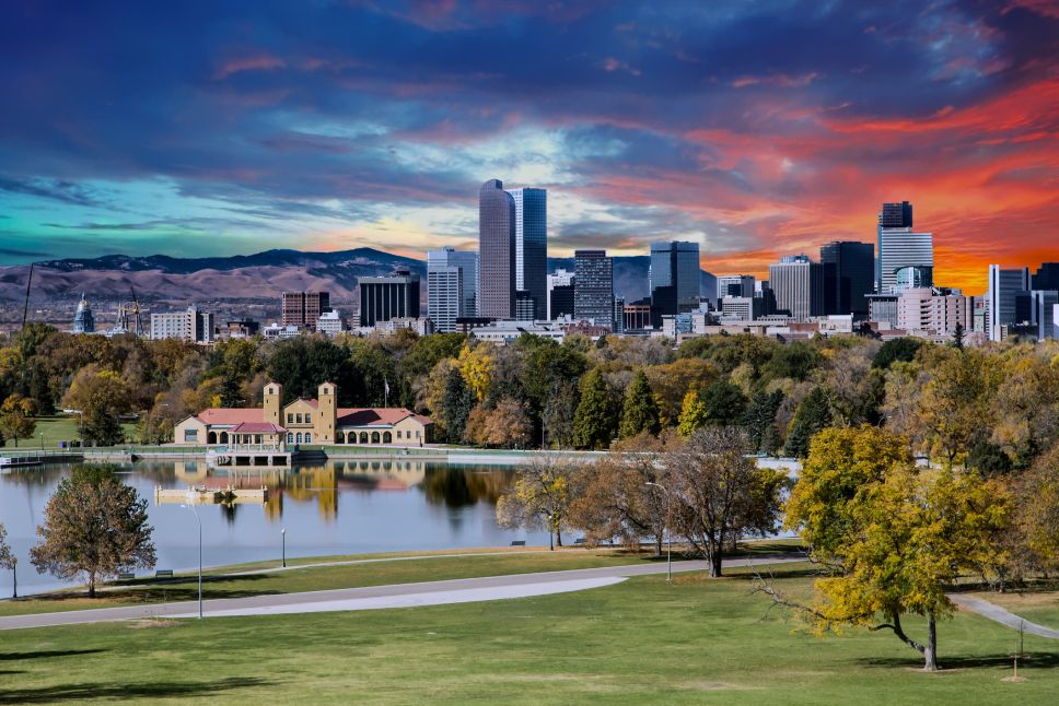 Denver skyline across city park in autumn