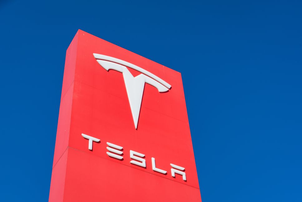 Austin , Texas , USA - November 11th , 2020: Tesla Motors now an SP500 company with a busy Pond Springs location in northwest Austin , TX