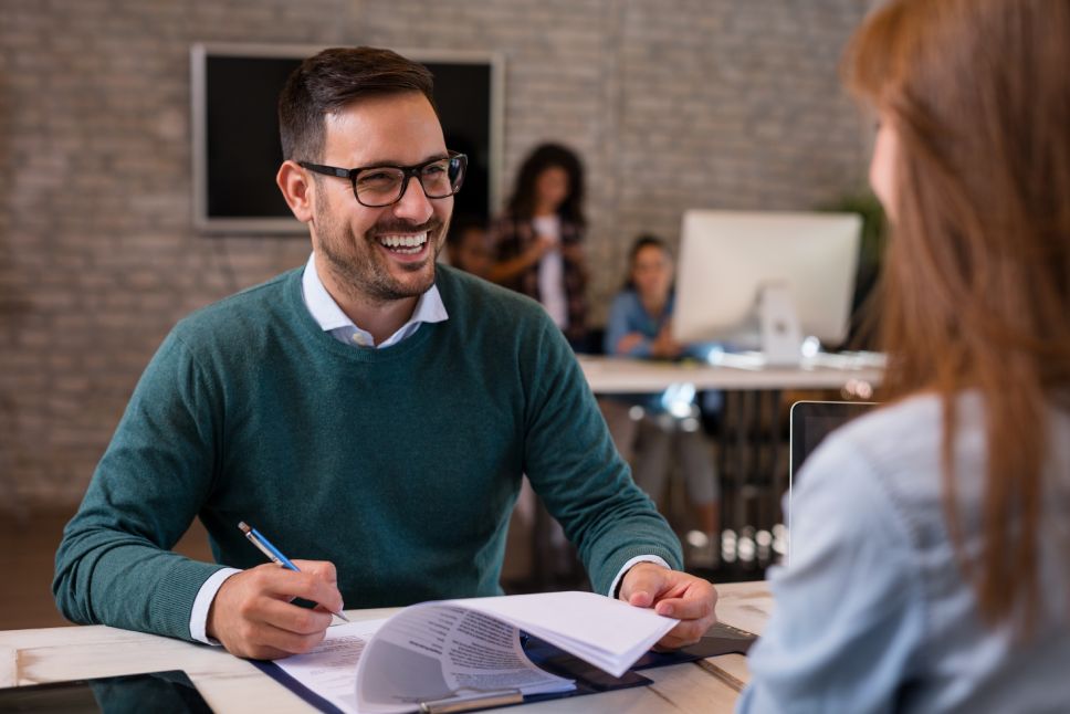 Job interview, businessman listen to candidate answers.