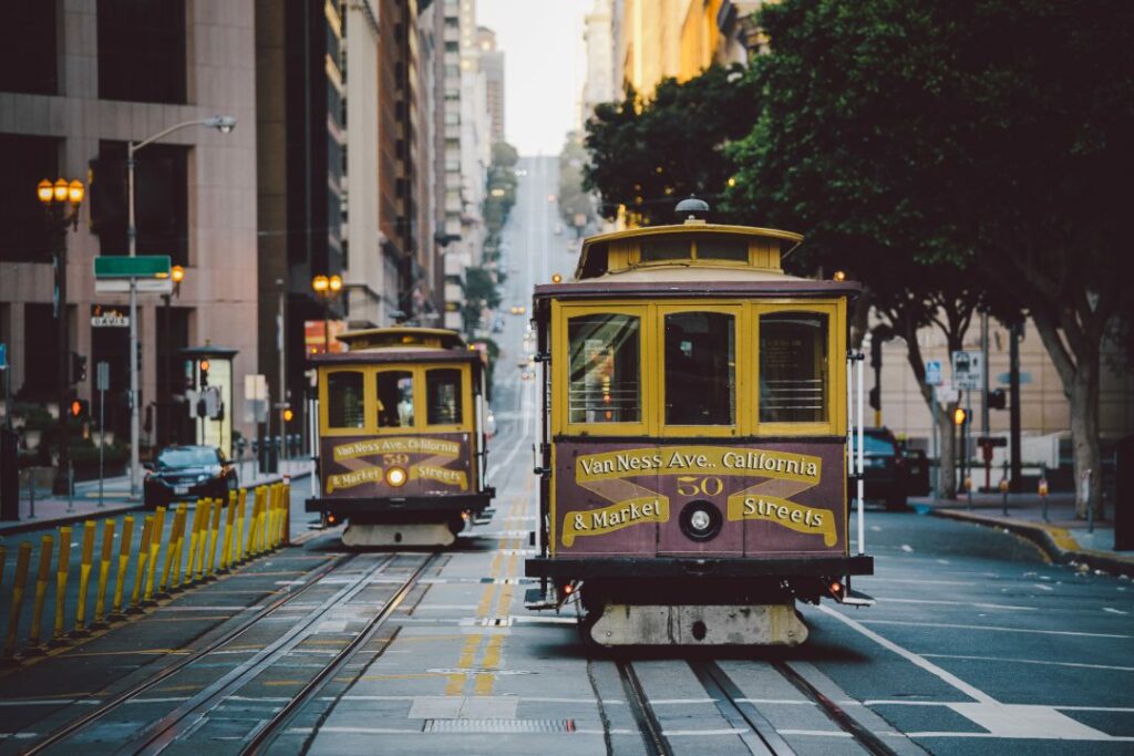 Classic panorama view of historic San Francisco Cable Cars on famous California Street at sunset with retro vintage Instagram style VSCO filter effect, central San Francisco, California, USA