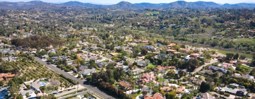 Aerial view of Rancho Santa Fe neighborhood with big mansions with pool in San Diego, California, USA. Aerial view of residential modern luxury house.