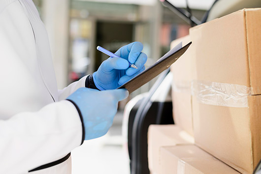 storage pharmacy. Worker doing inventory. 