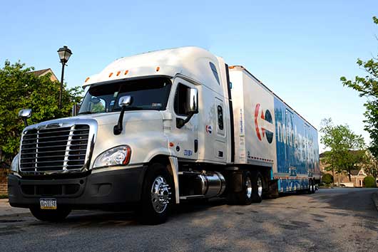 A semi truck on the road, illustrating Pool Table Moving Services available in San Diego County.